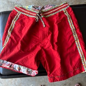 Robert Graham swim trunks.